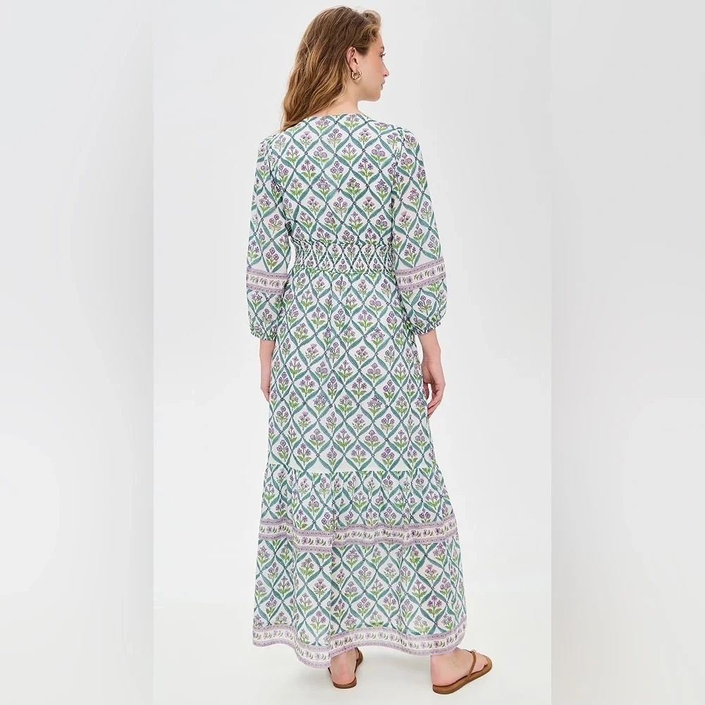 Sunny Spirit Maxi Boho Floral Print V Neck Flowy Tassel with Long Puff Sleeves.